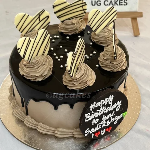 Classy Chocolate Themed Cake Topped with White Chocolate Hearts
