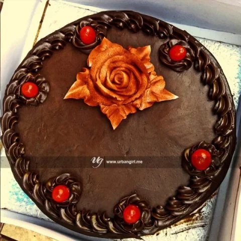 Chocolate Cake with Rose and Cherry on Top