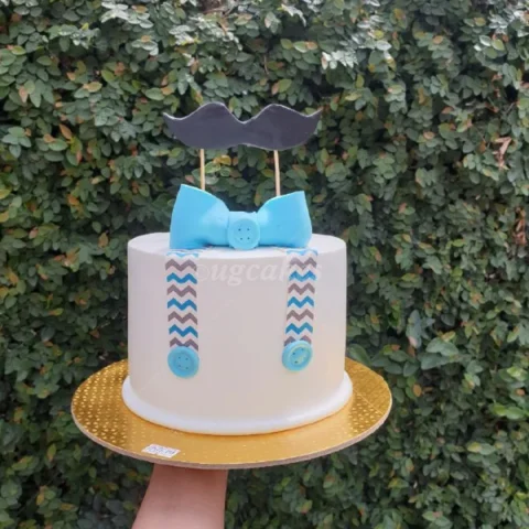 Bow-Tie And Mustache Cake
