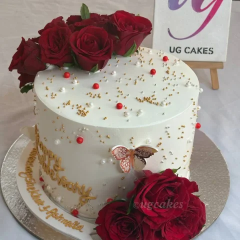Cake Topped with Roses and Pearls