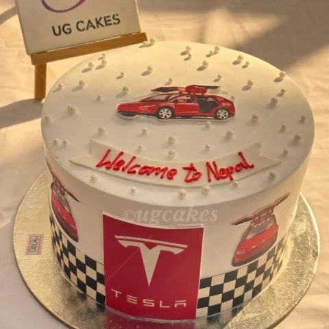 Car Themed Cake with Tesla Logo in Icing