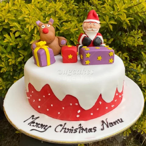 Christmas Cake with Santa Claus and reindeer fondant