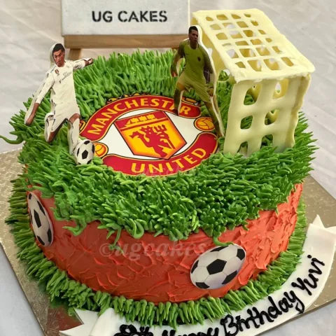 Manchesster United Logo Cake with Ronaldo Scoring Goal and Keeper on Goal Post