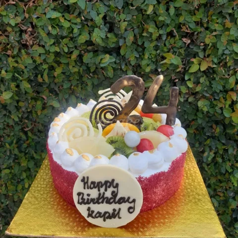 Red Velvet Cake with fruit toppings