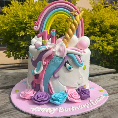 Unicorn theme cake with rainbow topping